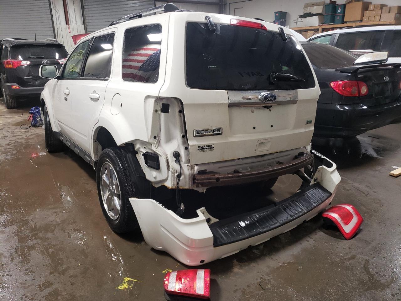 Photo 3 from auction – 2011 FORD ESCAPE LIM with VIN 1FMCU9EG5BKA53632