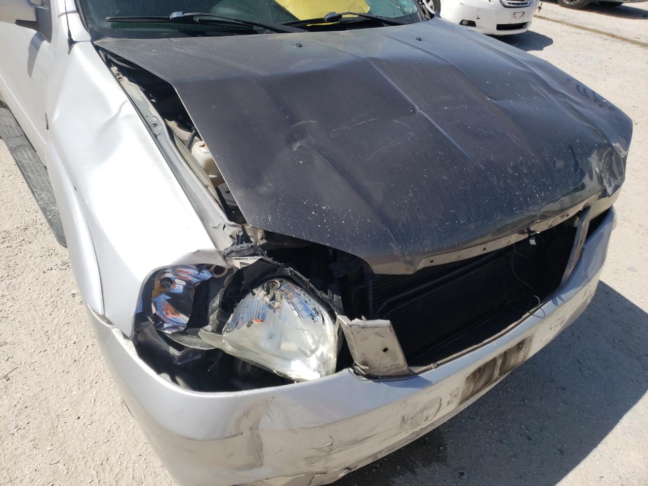 Photo 9 from auction – 2005 MAZDA TRIBUTE S with VIN 4F2YZ04115KM38873