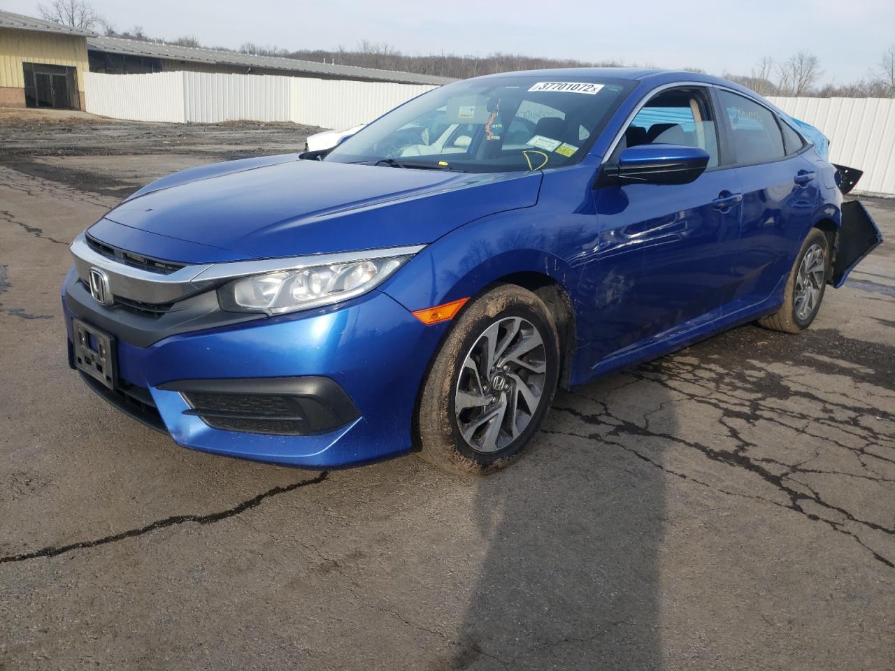 Photo 2 from auction – 2018 HONDA CIVIC EX with VIN 19XFC2F73JE202907