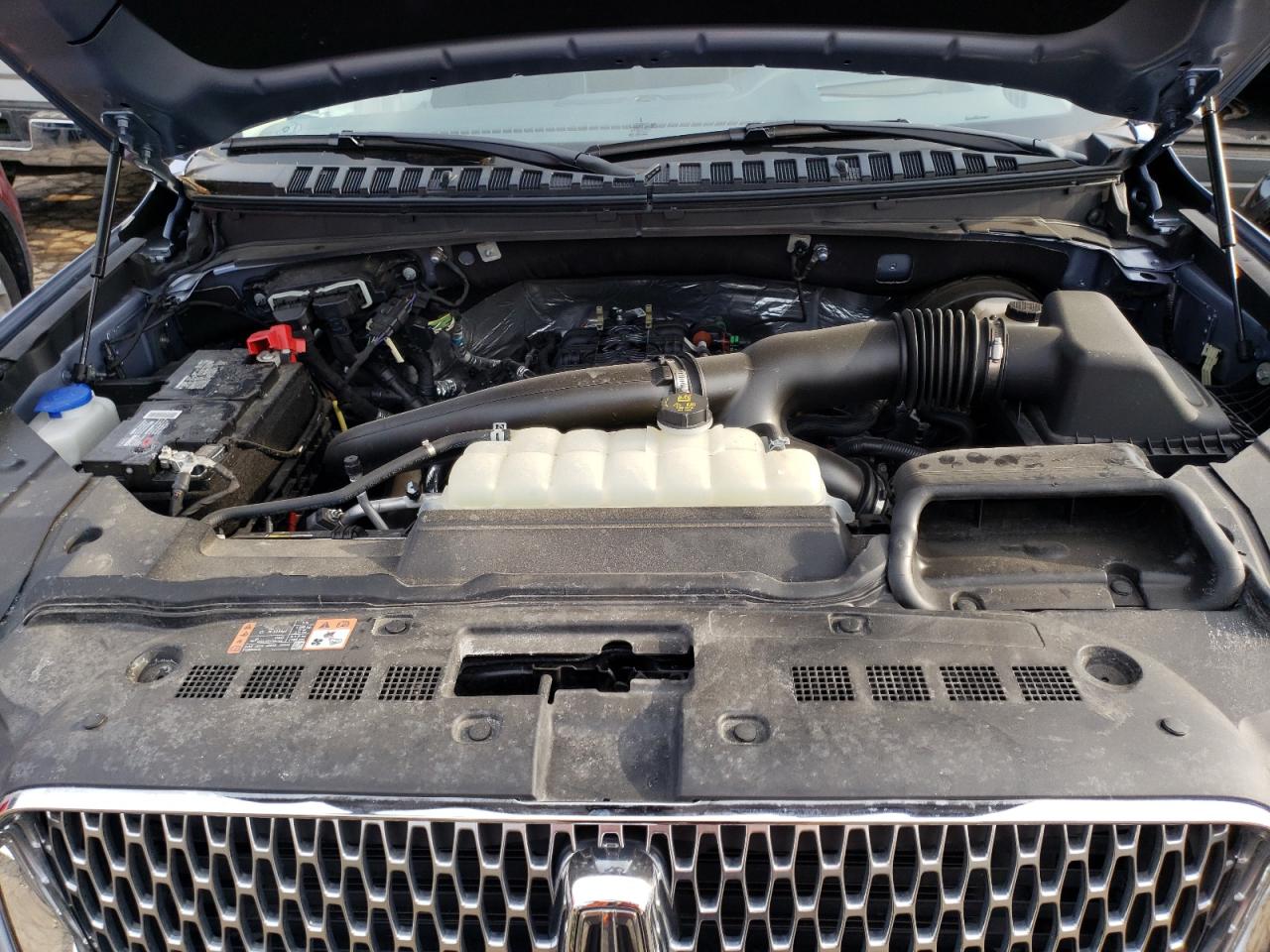 Photo 7 from auction – 2021 LINCOLN NAVIGATOR with VIN 5LMJJ2TTXMEL05929