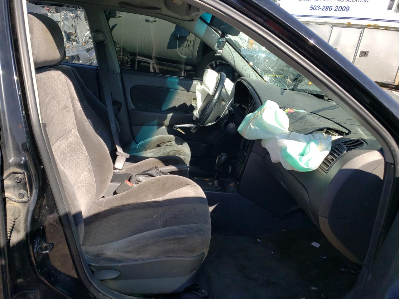 Photo 5 from auction – 2003 KIA SPECTRA with VIN KNAFB161535124506