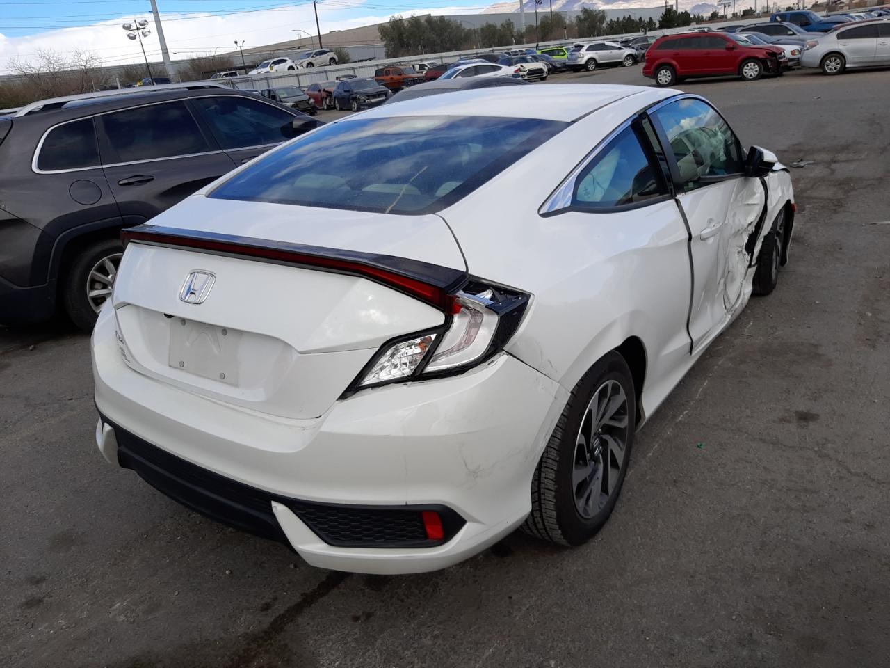 Photo 4 from auction – 2019 HONDA CIVIC LX with VIN 2HGFC4B68KH307765
