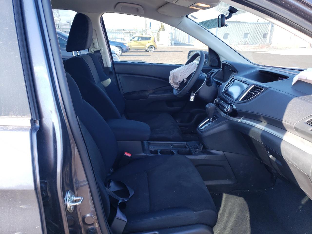 Photo 5 from auction – 2016 HONDA CR-V SE with VIN 2HKRM4H4XGH129063