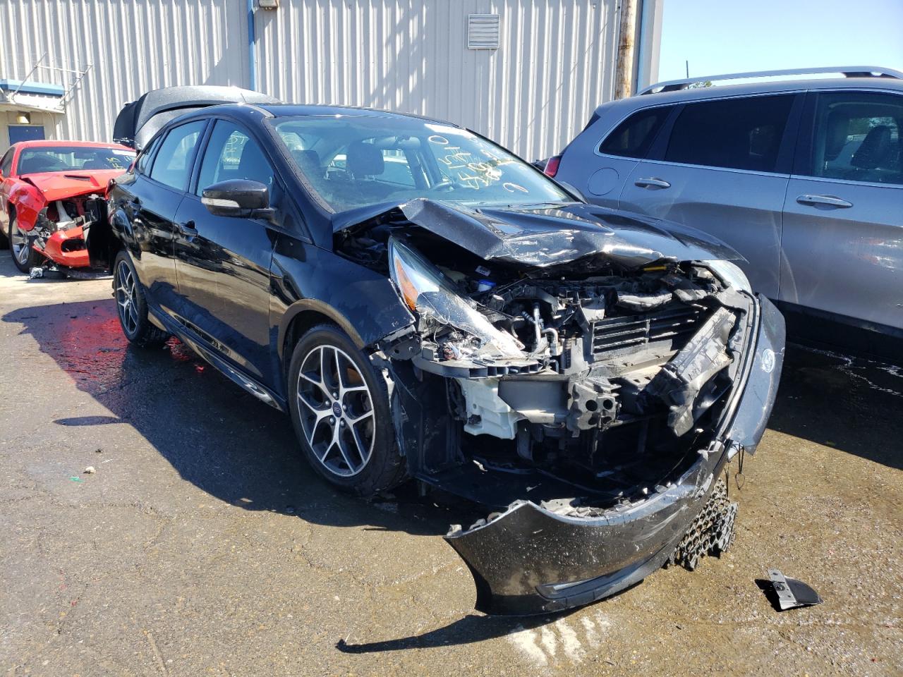 FORD FOCUS SE 2015 with VIN 1FADP3F2XFL298710 - Photo from auction