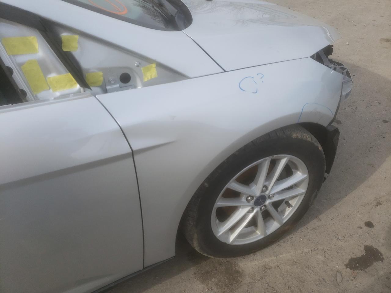Photo 9 from auction – 2017 FORD FOCUS SE with VIN 1FADP3K22HL215702