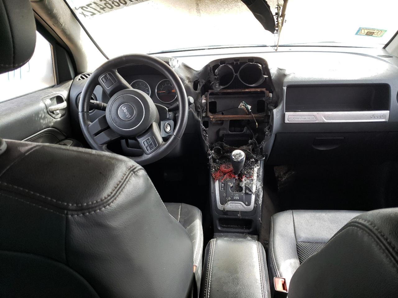 Photo 9 from auction – 2014 JEEP COMPASS LA with VIN 1C4NJDEB5ED855846