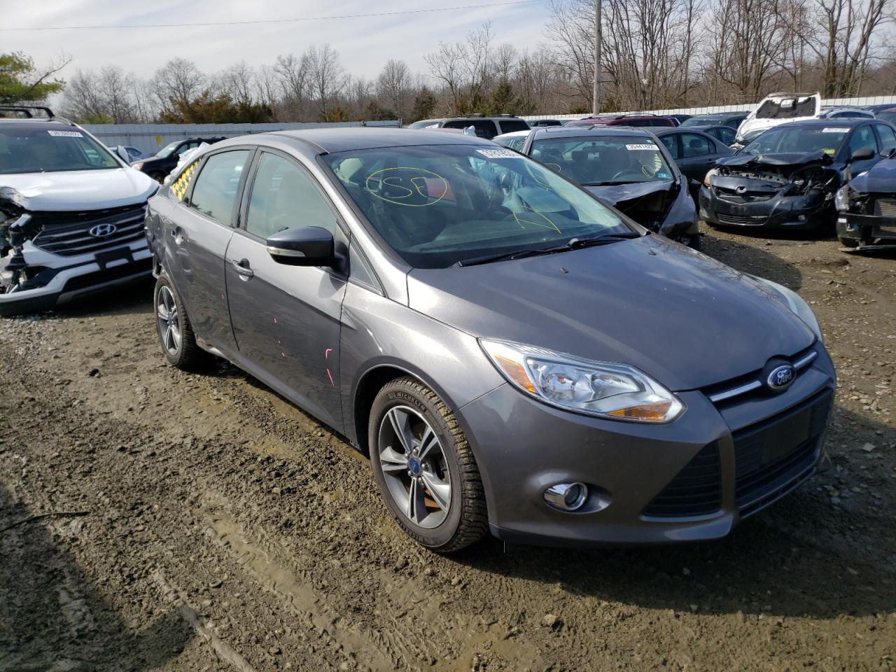 FORD FOCUS SE 2014 with VIN 1FADP3F29EL402201 - Photo from auction