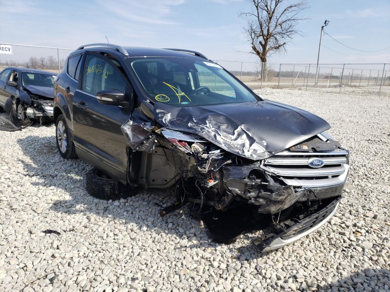 FORD ESCAPE TIT 2017 with VIN 1FMCU9J92HUB01284 - Photo from auction