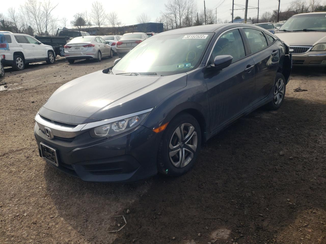 Photo 12 from auction – 2017 HONDA CIVIC LX with VIN 2HGFC2F54HH511302