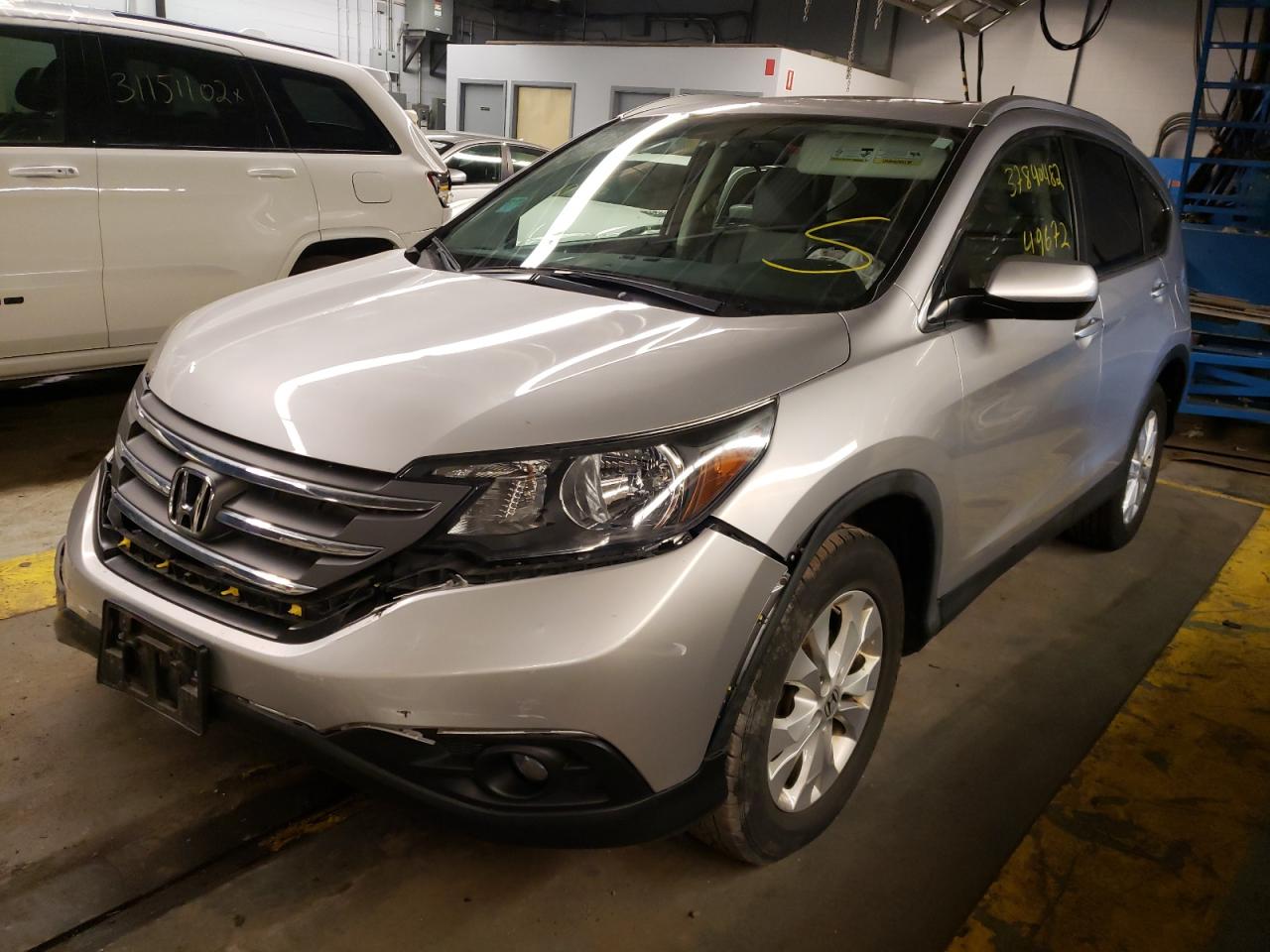 Photo 2 from auction – 2012 HONDA CR-V EXL with VIN 5J6RM3H7XCL011020