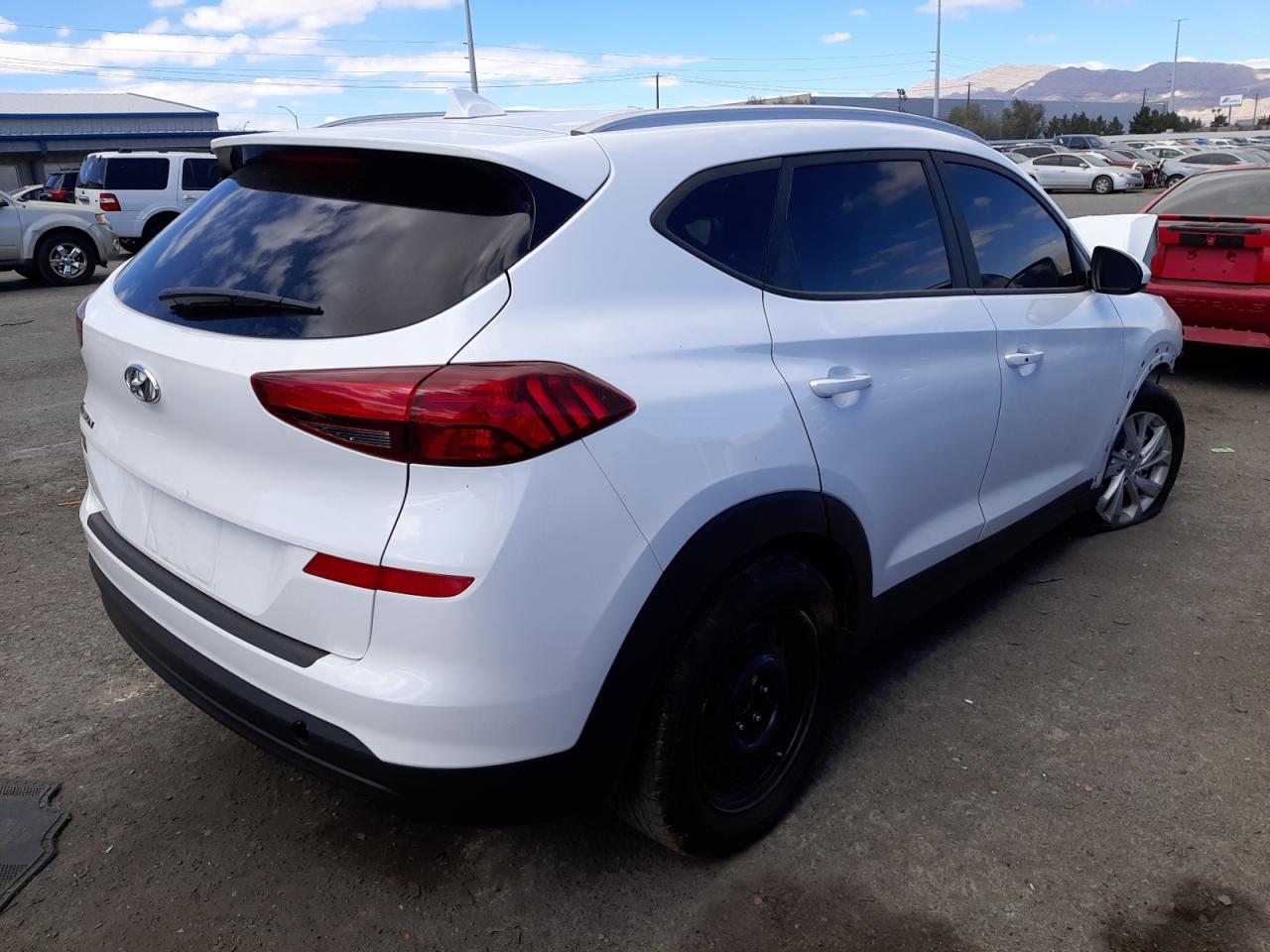 Photo 4 from auction – 2020 HYUNDAI TUCSON LIM with VIN KM8J33A44LU134694