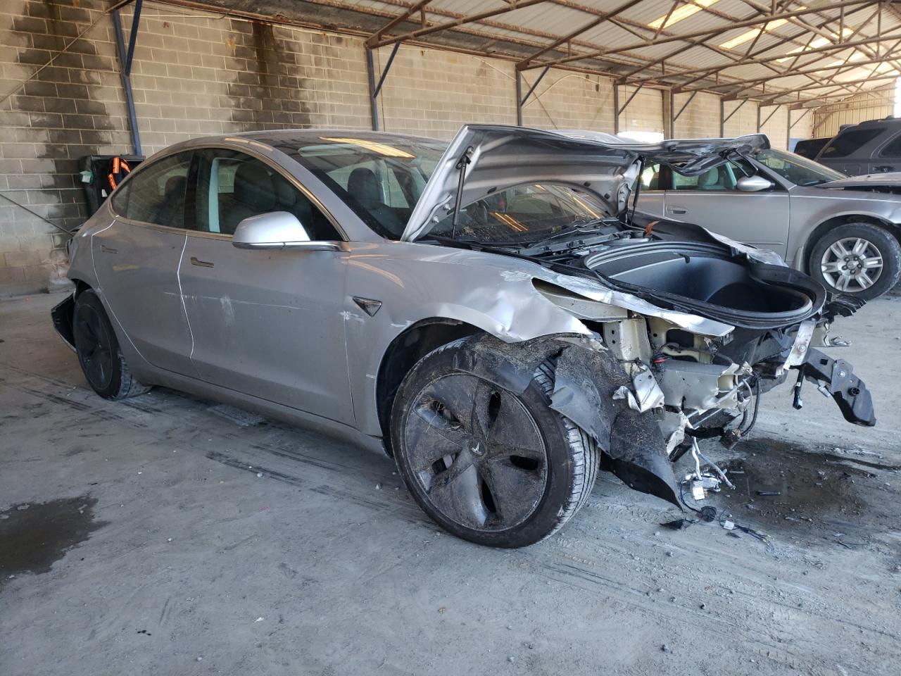 TESLA MODEL 3 2018 with VIN 5YJ3E1EA1JF039592 - Photo from auction
