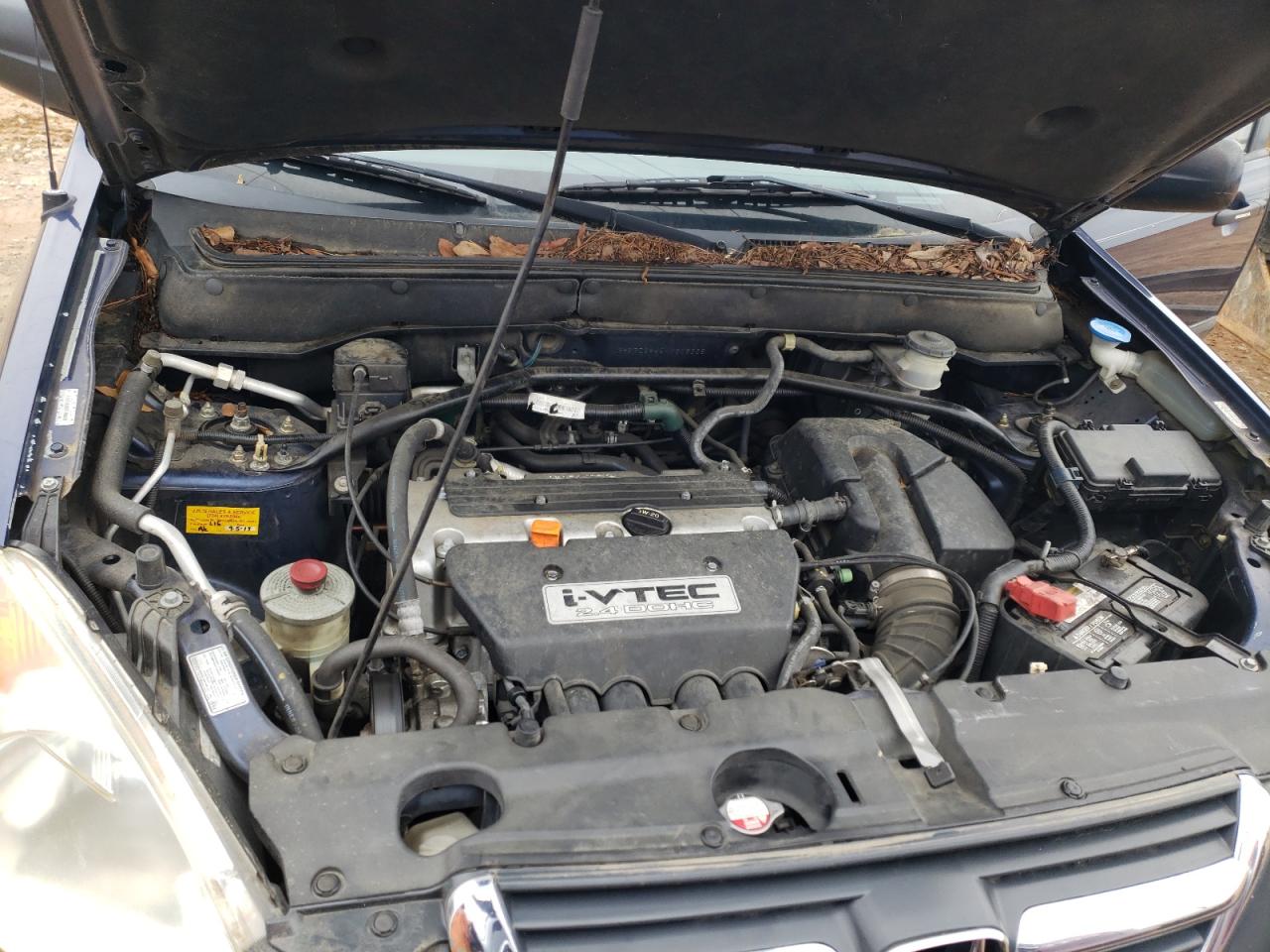 Photo 7 from auction – 2004 HONDA CR-V LX with VIN SHSRD68454U206338