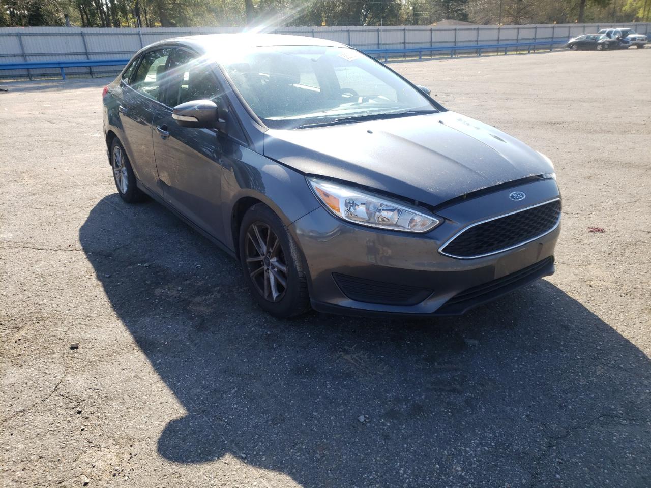 FORD FOCUS SE 2016 with VIN 1FADP3F2XGL224110 - Photo from auction