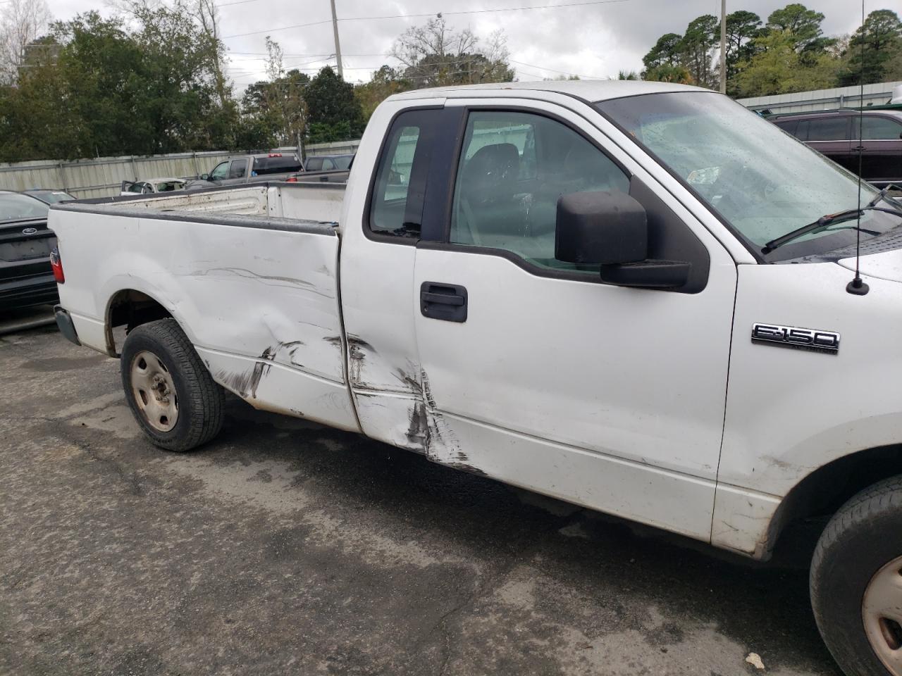 Photo 9 from auction – 2005 FORD F150 with VIN 1FTRF12W65NA36489