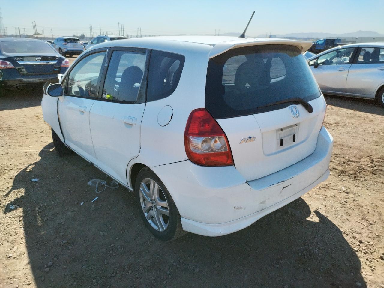 Photo 3 from auction – 2007 HONDA FIT S with VIN JHMGD38697S041009