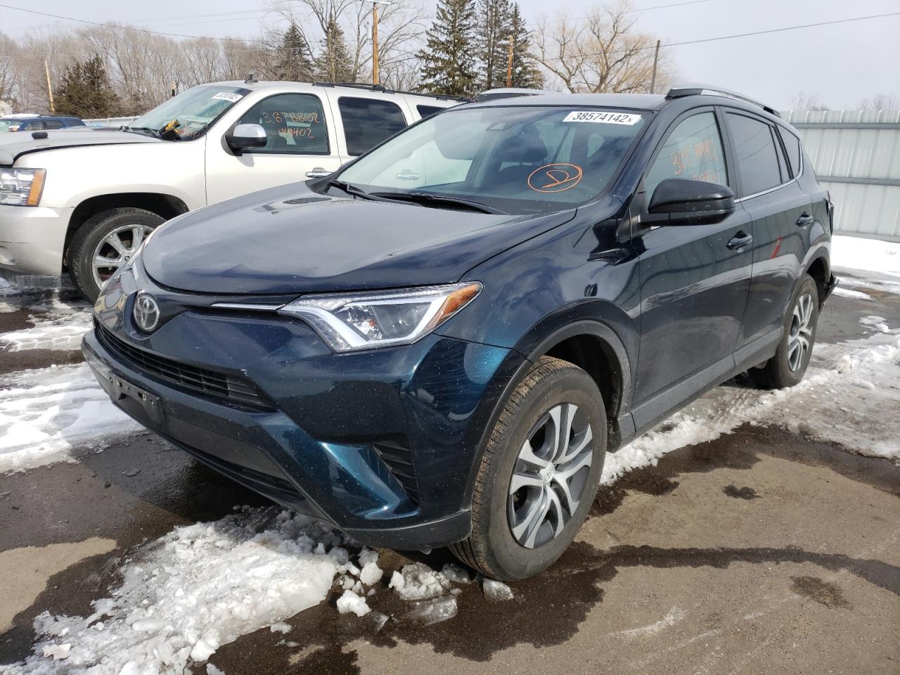 Photo 2 from auction – 2017 TOYOTA RAV4 LE with VIN 2T3BFREV0HW659249