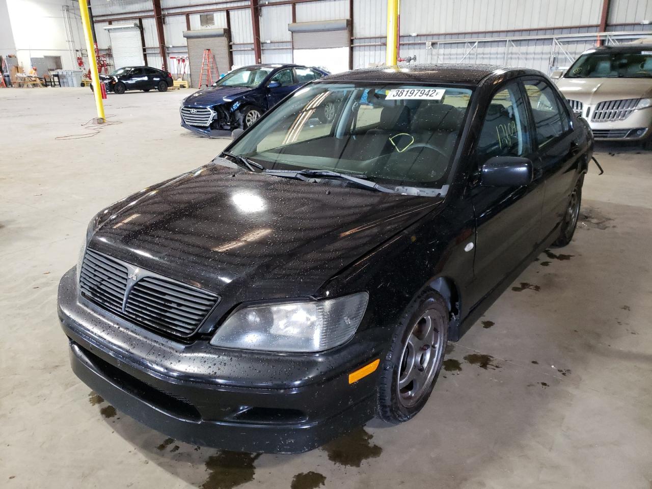 Photo 2 from auction – 2002 MITSUBISHI LANCER with VIN JA3AJ86E32U029540