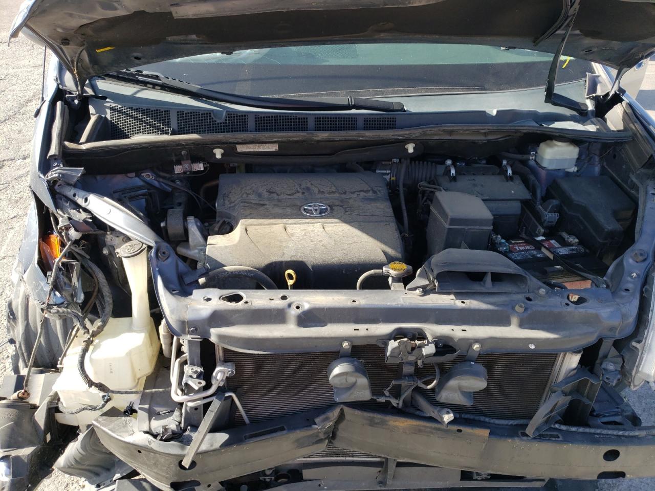 Photo 7 from auction – 2014 TOYOTA SIENNA LE with VIN 5TDKK3DC2ES414572