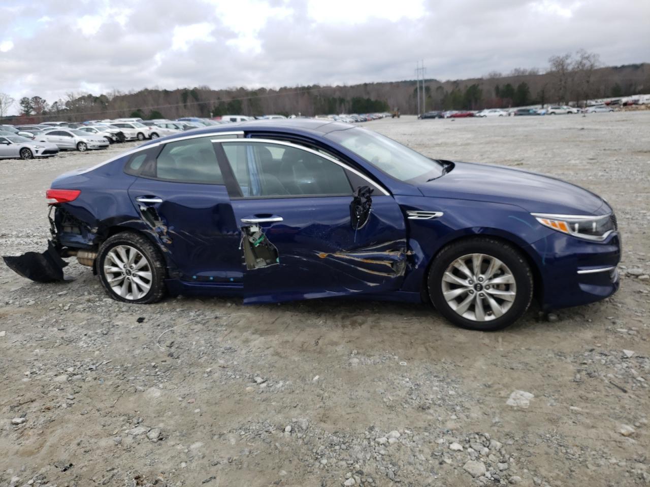 Photo 9 from auction – 2016 KIA OPTIMA EX with VIN 5XXGU4L36GG011447