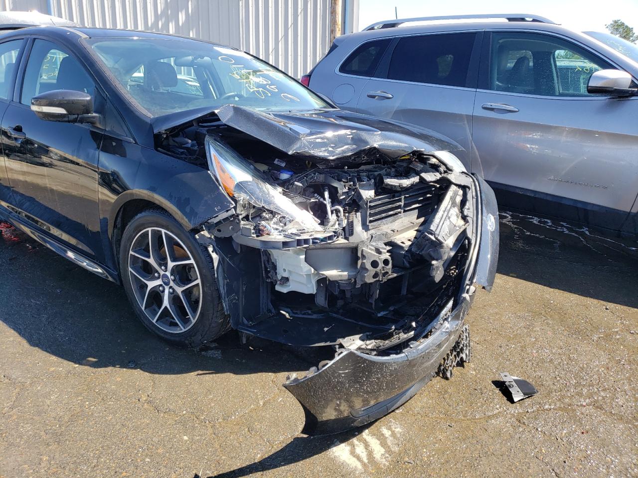 Photo 9 from auction – 2015 FORD FOCUS SE with VIN 1FADP3F2XFL298710