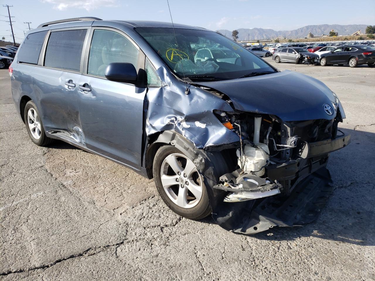 TOYOTA SIENNA LE 2014 with VIN 5TDKK3DC2ES414572 - Photo from auction