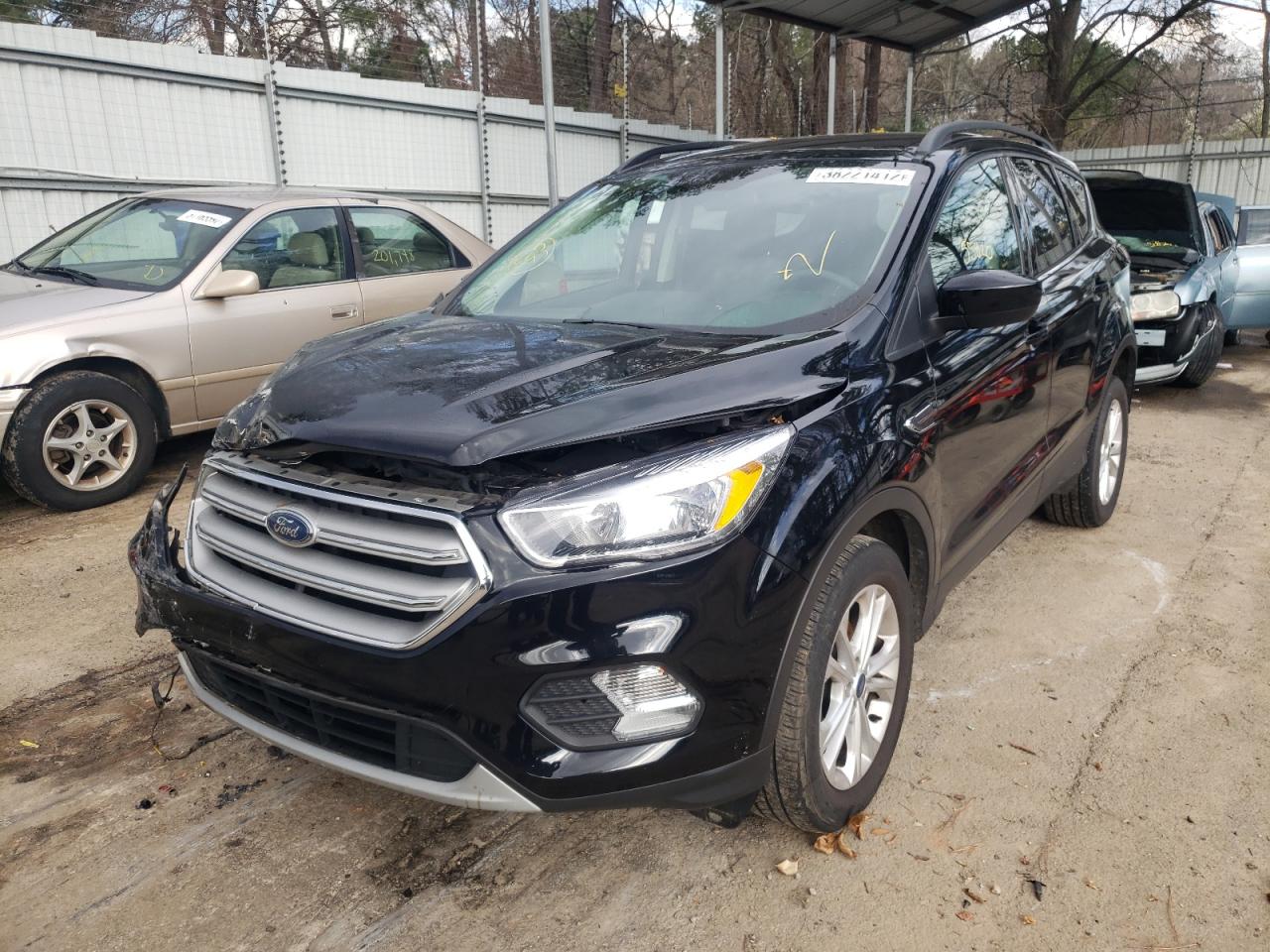 Photo 2 from auction – 2018 FORD ESCAPE SE with VIN 1FMCU0GD4JUC03490