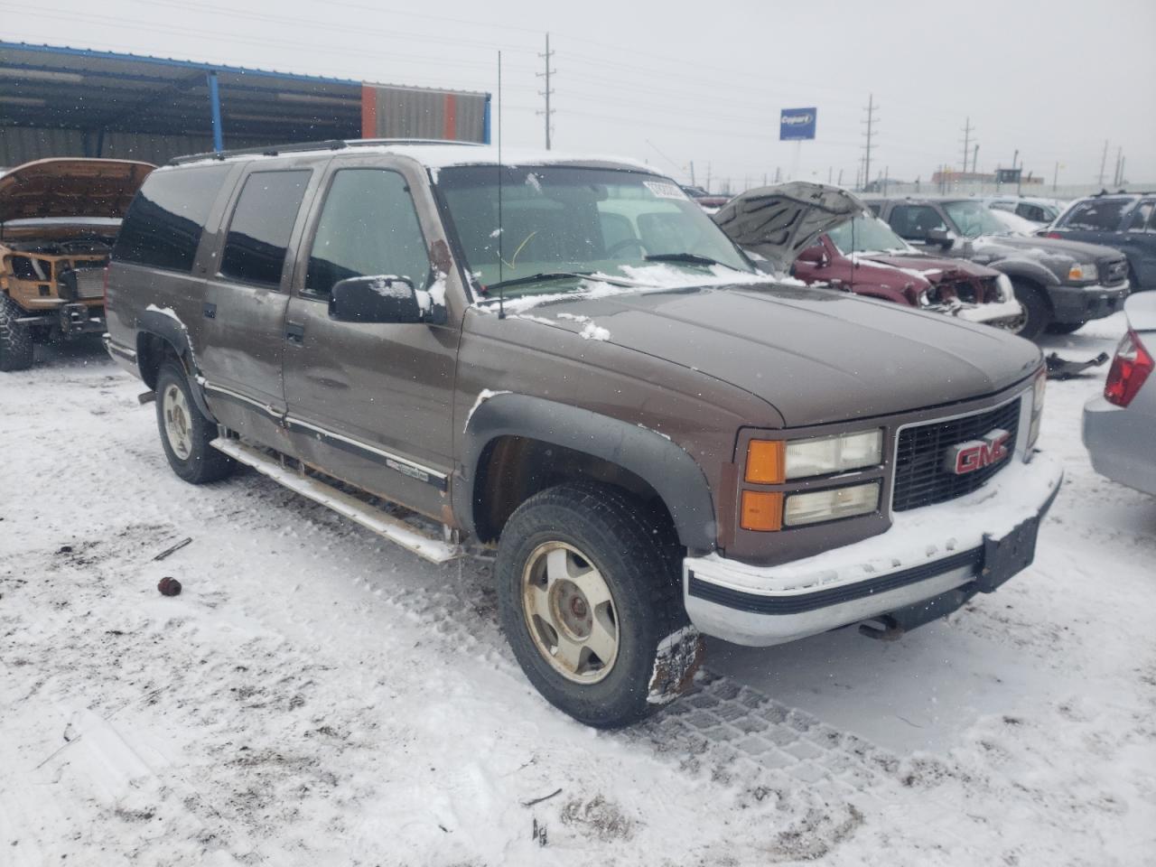 GMC SUBURBAN K 1997 with VIN 3GKFK16R5VG519987 - Photo from auction