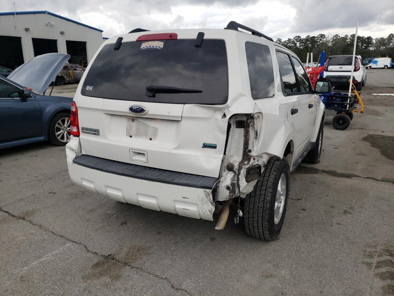 Photo 9 from auction – 2010 FORD ESCAPE XLT with VIN 1FMCU0DG1AKD34158