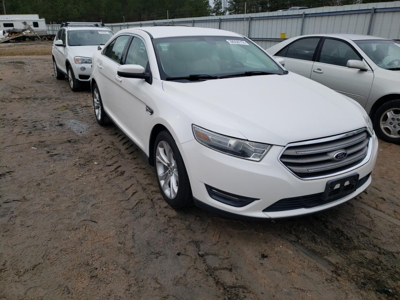 FORD TAURUS SEL 2013 with VIN 1FAHP2E83DG140068 - Photo from auction