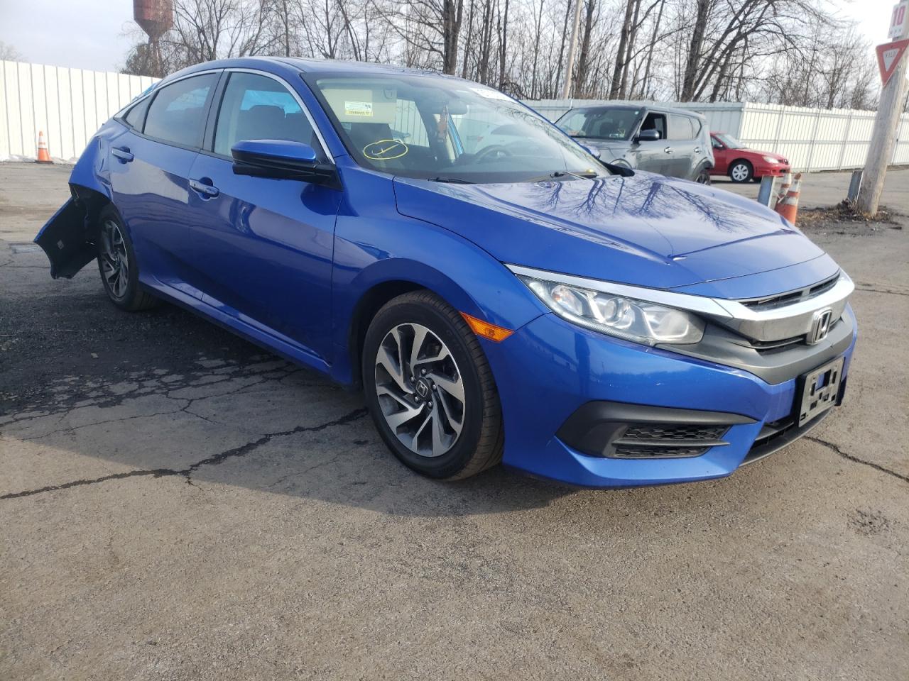 HONDA CIVIC EX 2018 with VIN 19XFC2F73JE202907 - Photo from auction