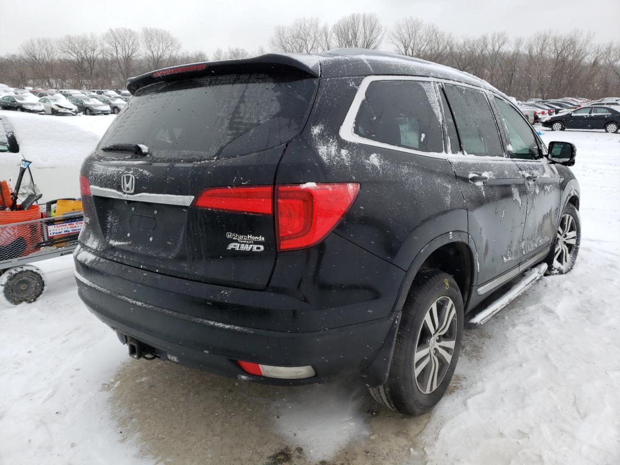 Photo 4 from auction – 2016 HONDA PILOT EXL with VIN 5FNYF6H50GB044533