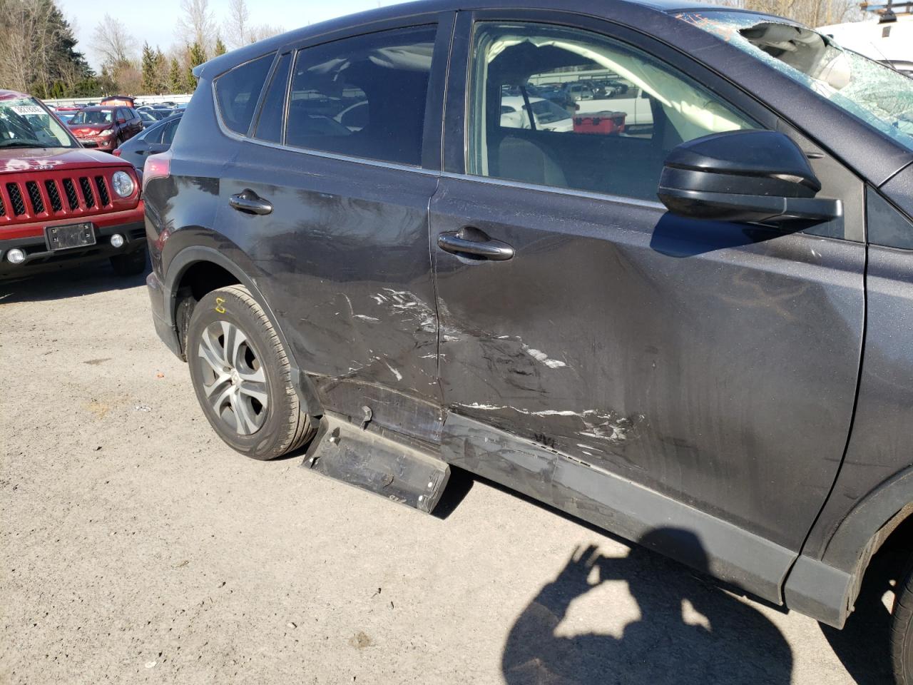 Photo 9 from auction – 2017 TOYOTA RAV4 LE with VIN JTMZFREV9HJ148068