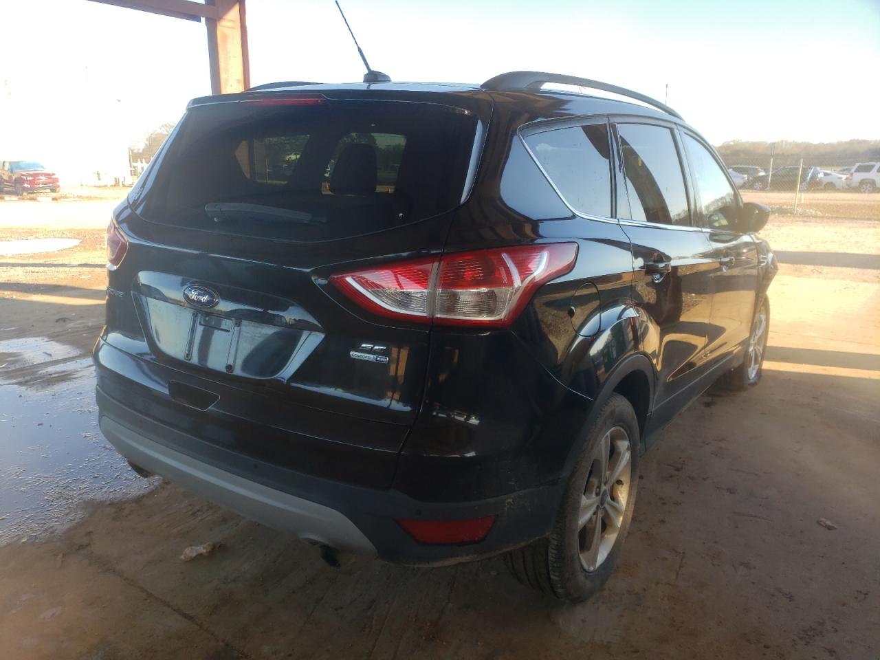 Photo 4 from auction – 2014 FORD ESCAPE SE with VIN 1FMCU9G93EUC77215