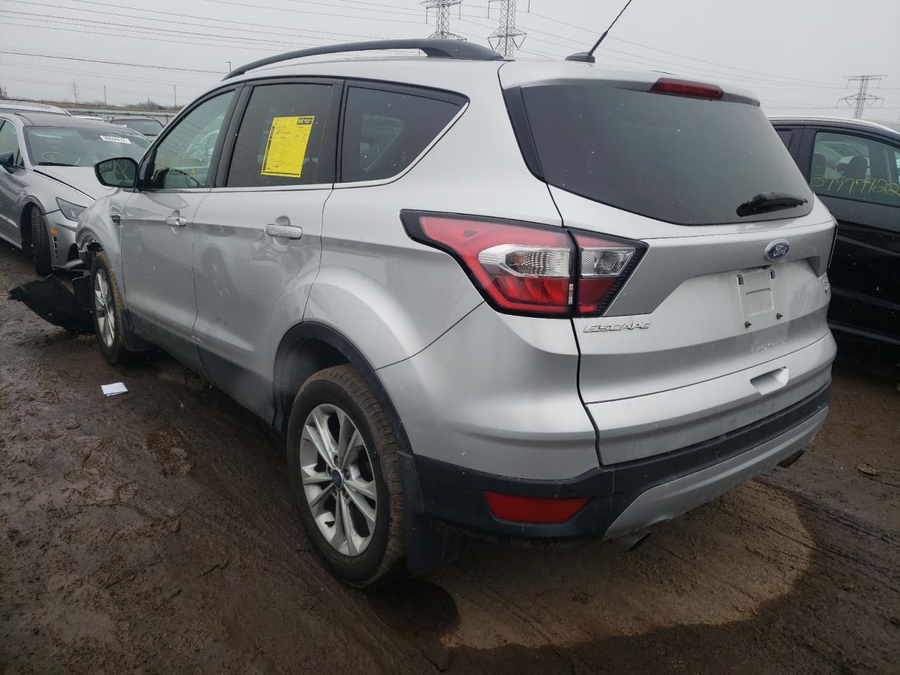 Photo 3 from auction – 2017 FORD ESCAPE SE with VIN 1FMCU9GD6HUE79667
