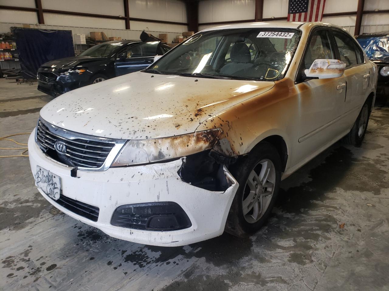 Photo 2 from auction – 2009 KIA OPTIMA LX with VIN KNAGE228995312426