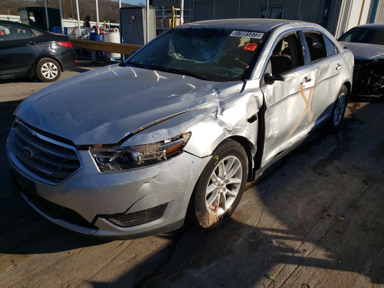 Photo 9 from auction – 2015 FORD TAURUS SE with VIN 1FAHP2D81FG127999