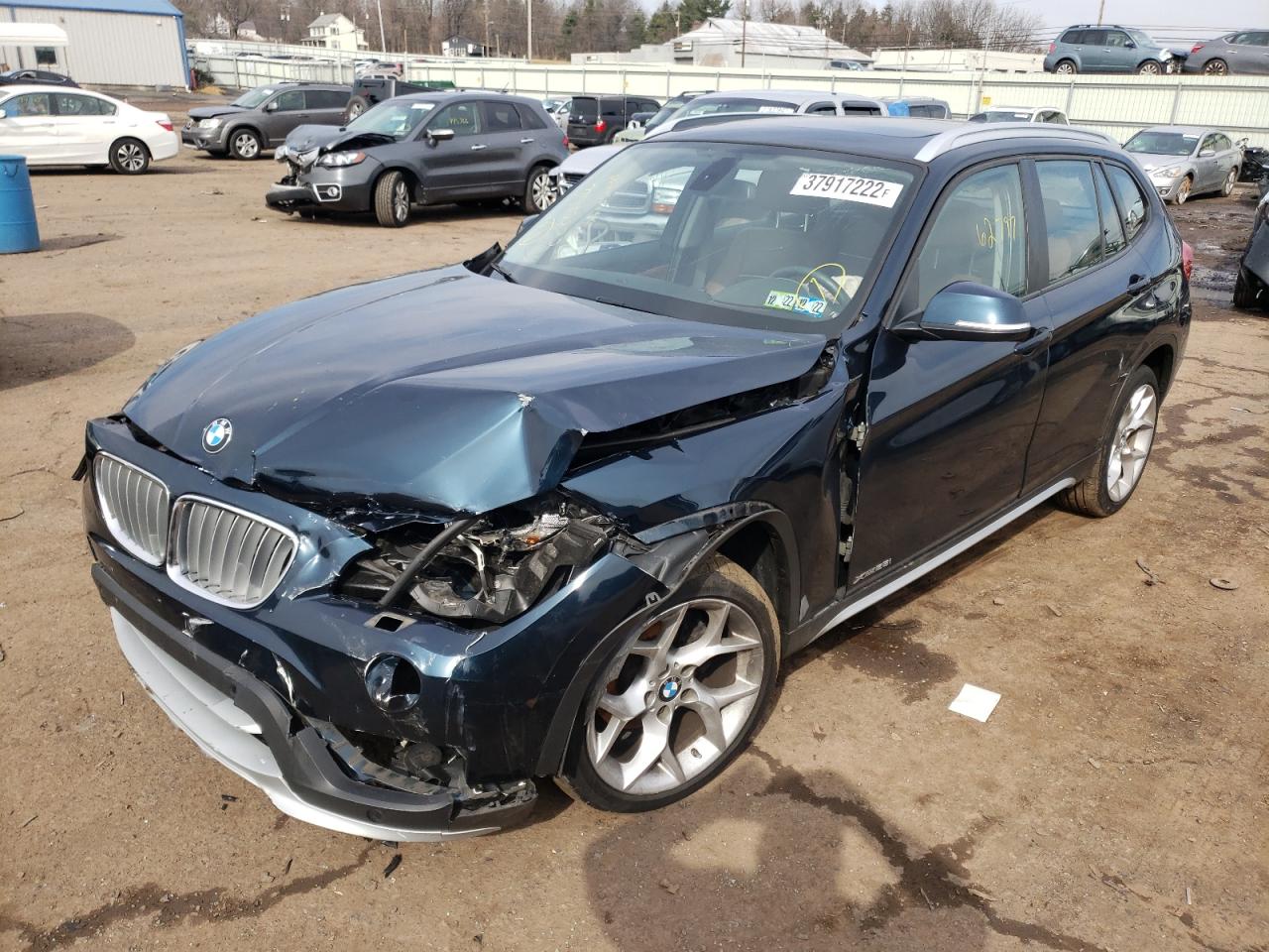 Photo 2 from auction – 2015 BMW X1 XDRIVE2 with VIN WBAVL1C57FVY38464