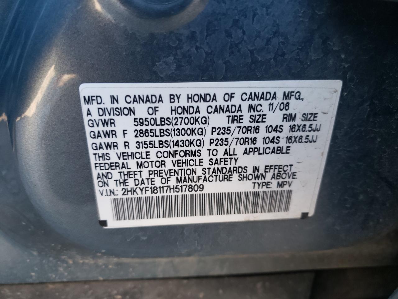 Photo 10 from auction – 2007 HONDA PILOT LX with VIN 2HKYF18117H517809