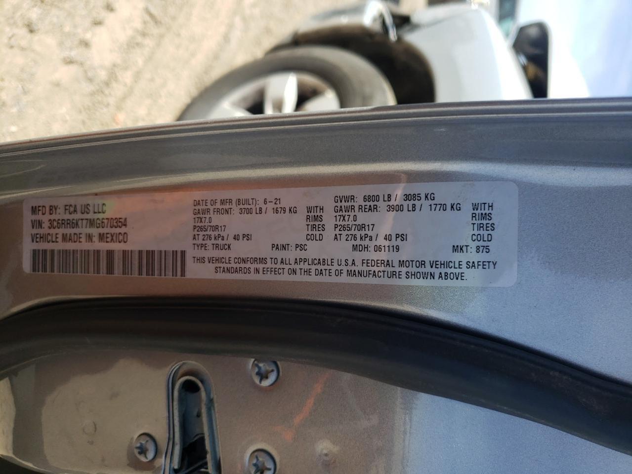 Photo 10 from auction – 2021 RAM 1500 CLASS with VIN 3C6RR6KT7MG670354