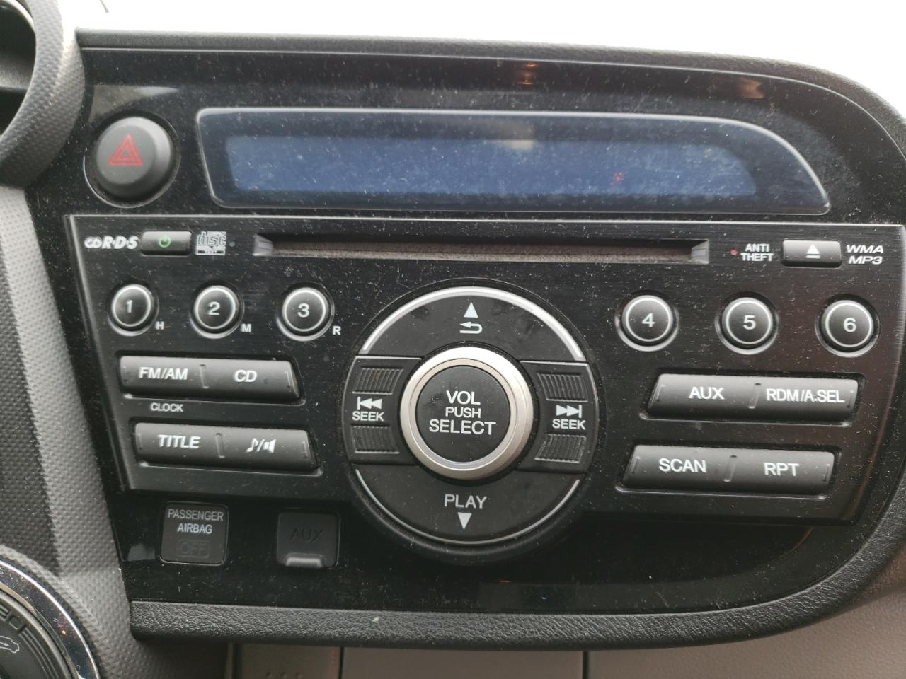 Photo 9 from auction – 2011 HONDA INSIGHT LX with VIN JHMZE2H58BS007501