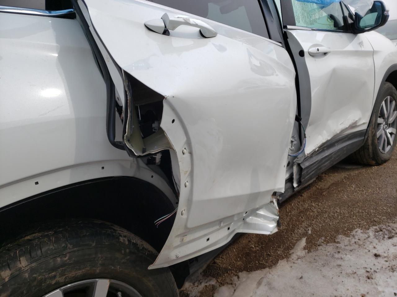 Photo 9 from auction – 2021 HONDA PILOT EXL with VIN 5FNYF6H54MB029366