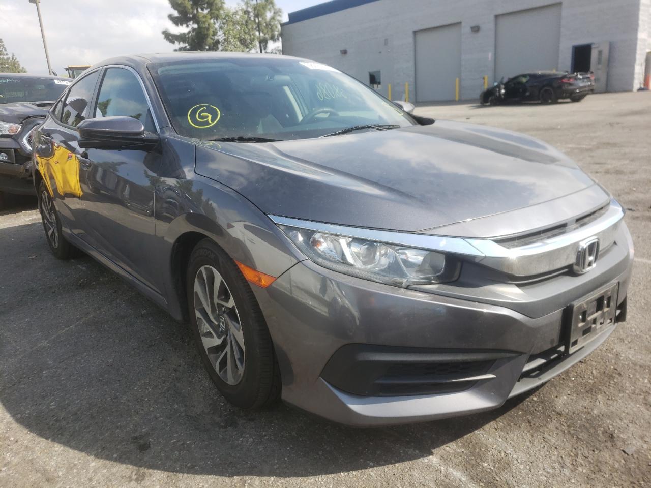Photo 1 from auction – 2018 HONDA CIVIC EX with VIN 2HGFC2F73JH592588