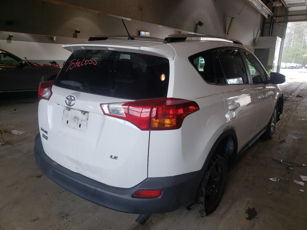 Photo 4 from auction – 2014 TOYOTA RAV4 LE with VIN JTMZFREV6EJ021242
