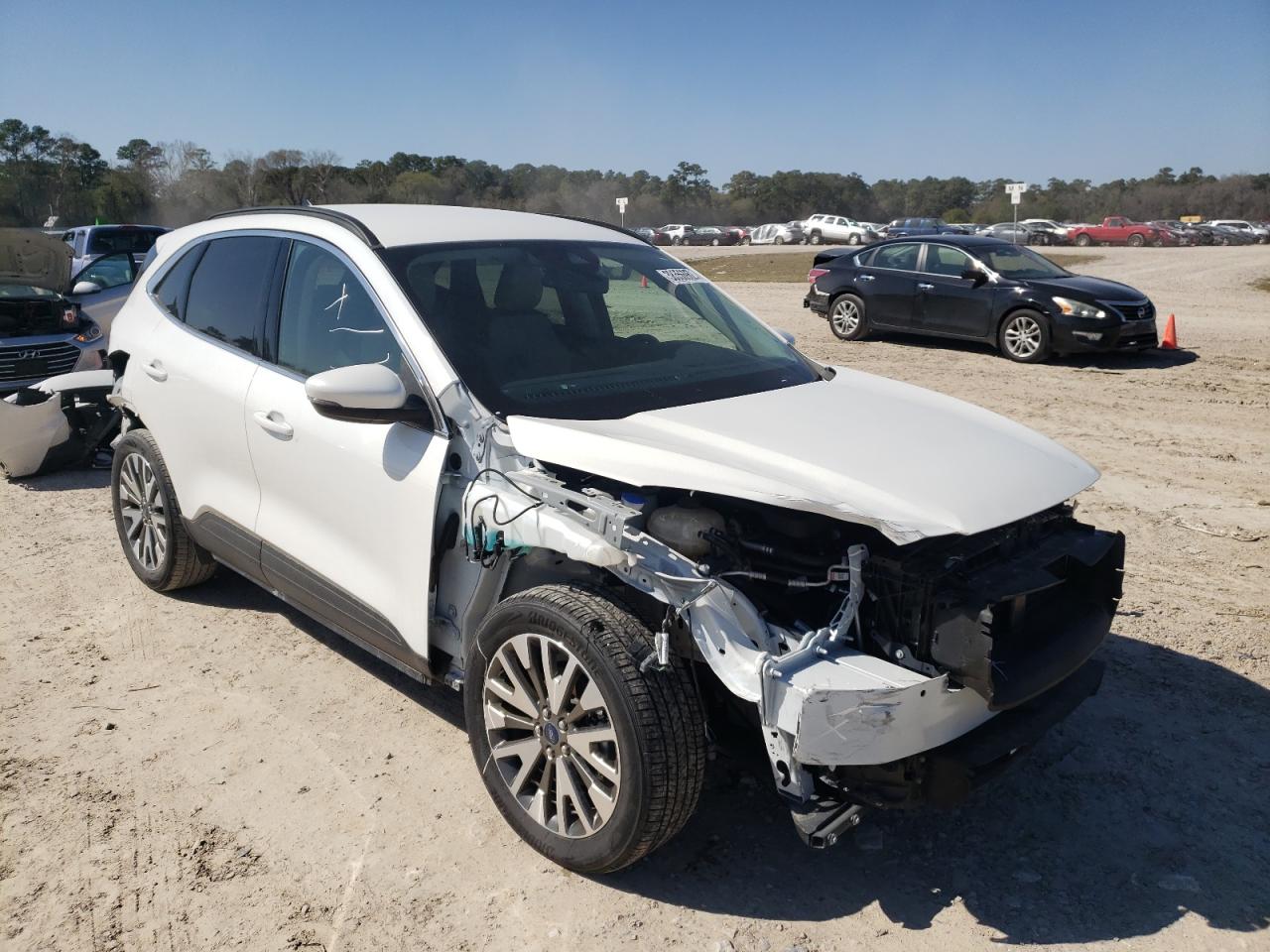 FORD ESCAPE TIT 2020 with VIN 1FMCU9J92LUB17641 - Photo from auction