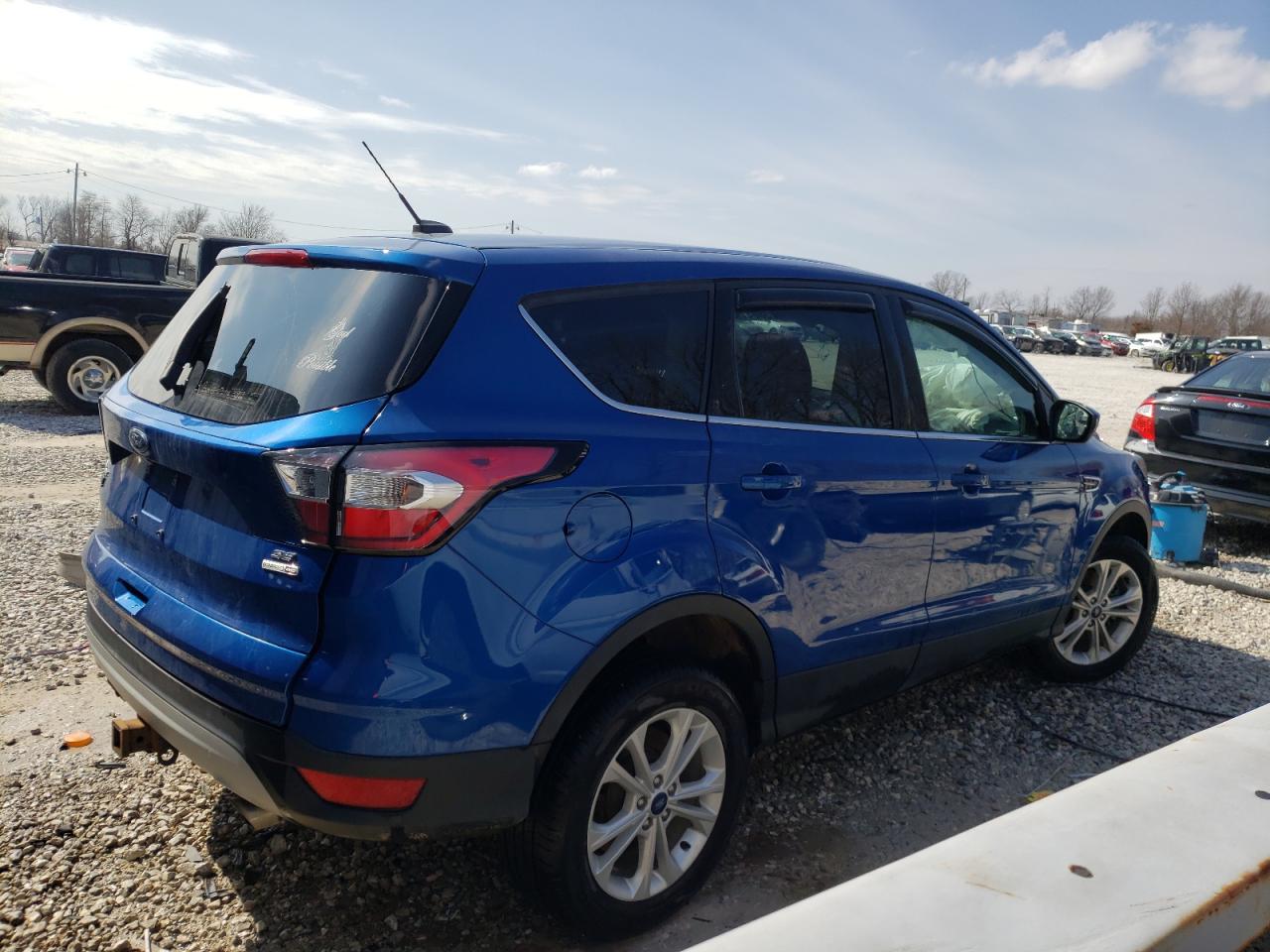 Photo 4 from auction – 2017 FORD ESCAPE SE with VIN 1FMCU9G92HUE54440