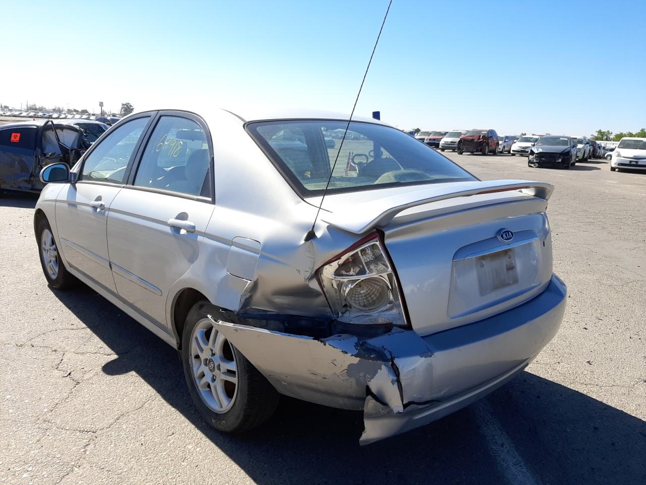 Photo 3 from auction – 2004 KIA SPECTRA LX with VIN KNAFE121745042162