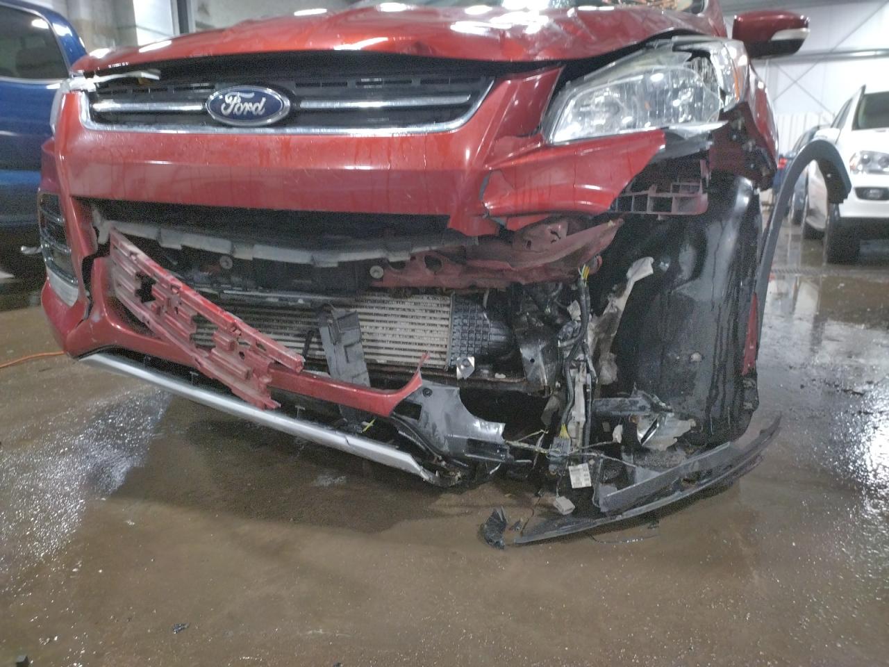 Photo 9 from auction – 2015 FORD ESCAPE TIT with VIN 1FMCU9J96FUA20351