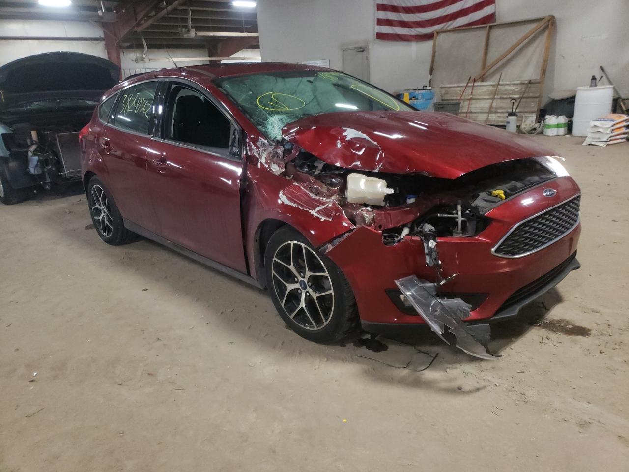 FORD FOCUS SEL 2017 with VIN 1FADP3M24HL341248 - Photo from auction