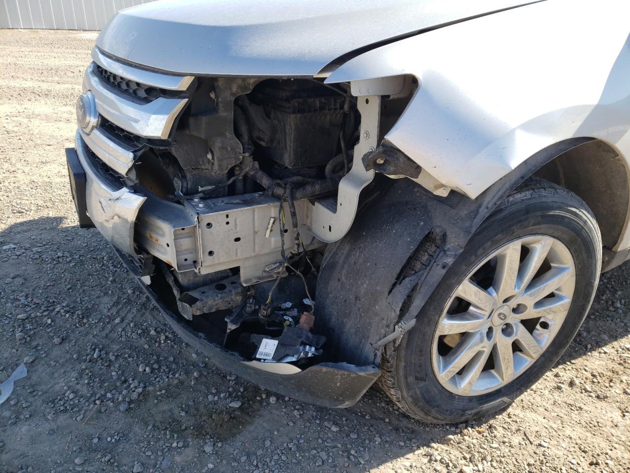 Photo 9 from auction – 2011 FORD EDGE LIMIT with VIN 2FMDK4KC1BBA77743